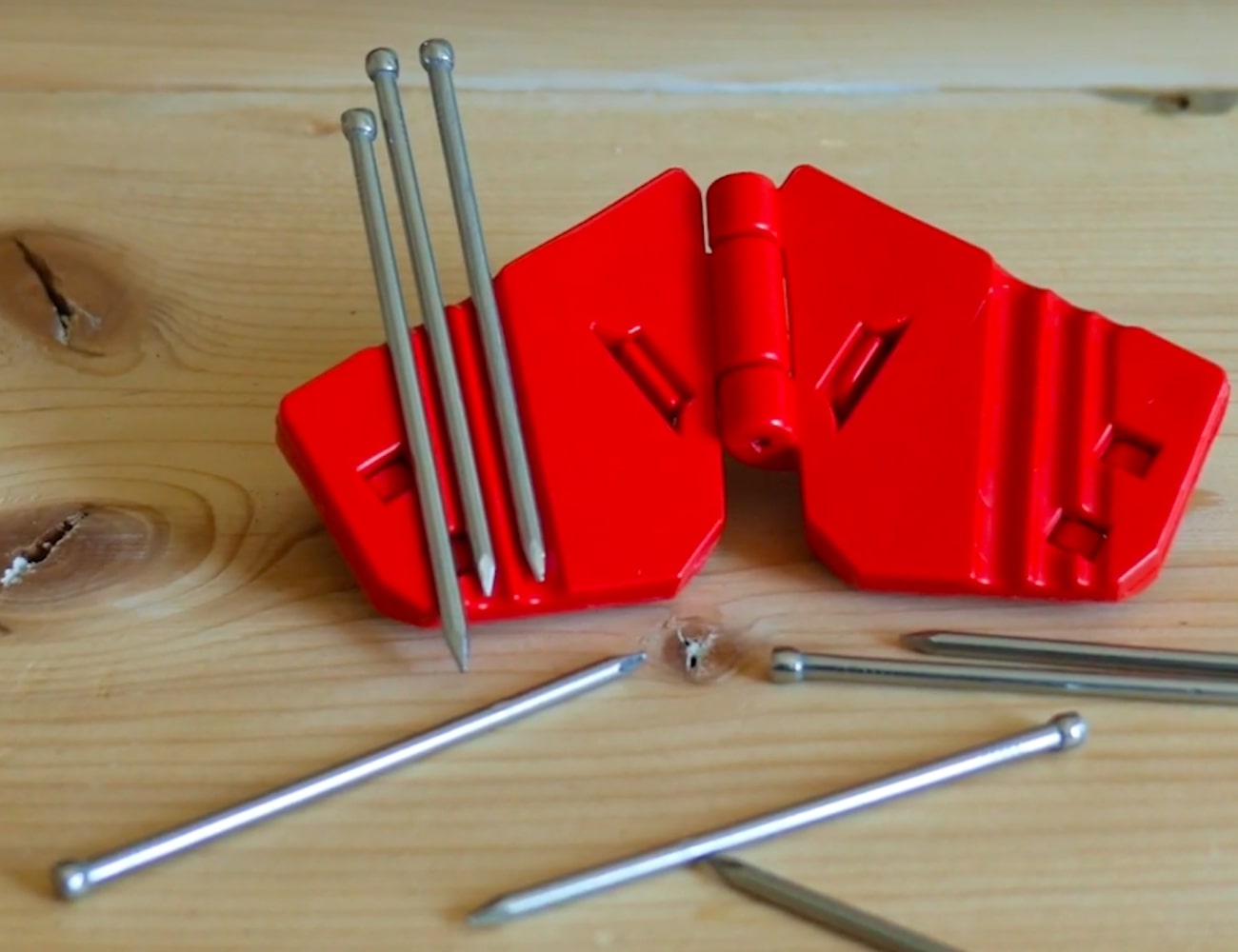 This little gadget holds your nail in place while protecting your fingers