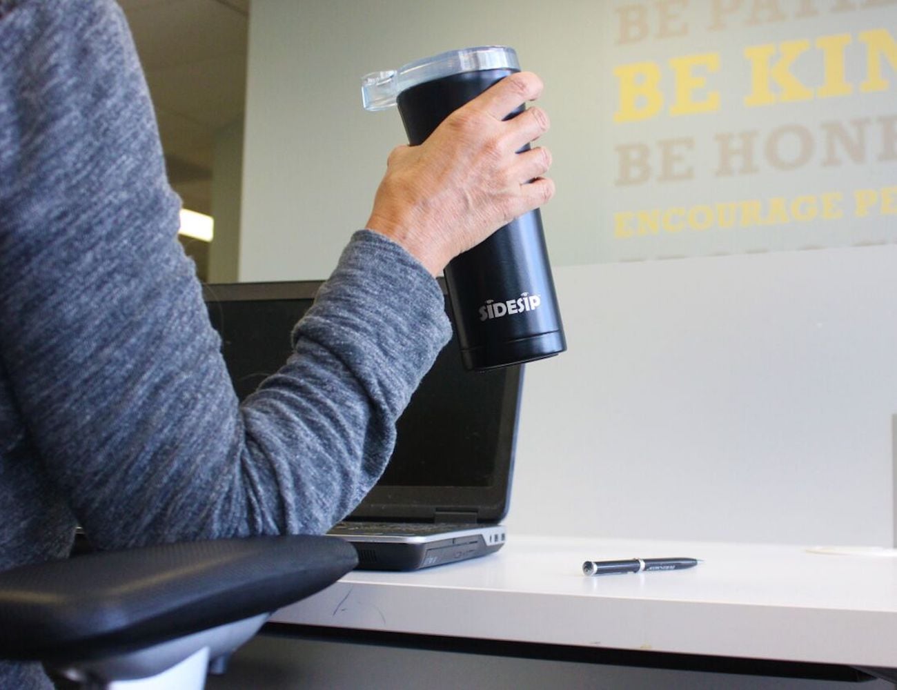 Sidesip safe travel drink container allows you to drink and sip safely