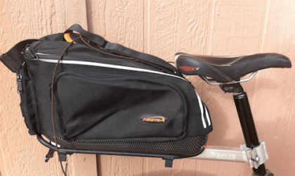 A close-up side view of a bike bag on the back of a bicycle.