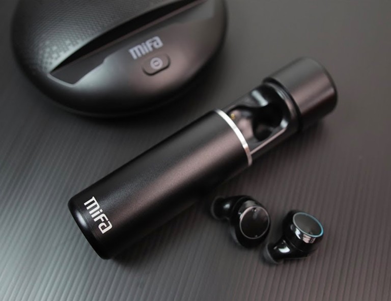 Set of earbuds and their included charging case