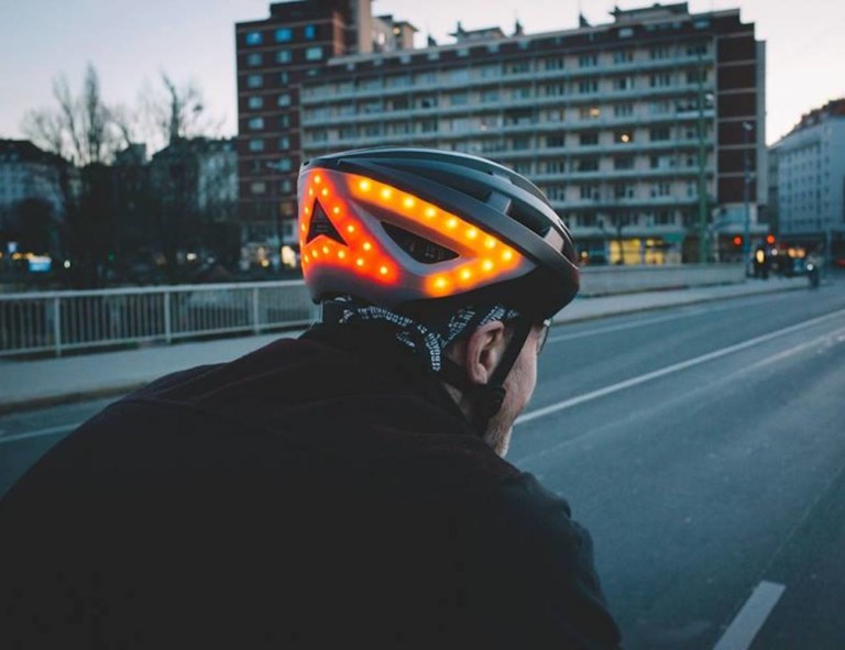 The back of a man's head, and he is wearing a cool gadgets 2019 light-up helmet.