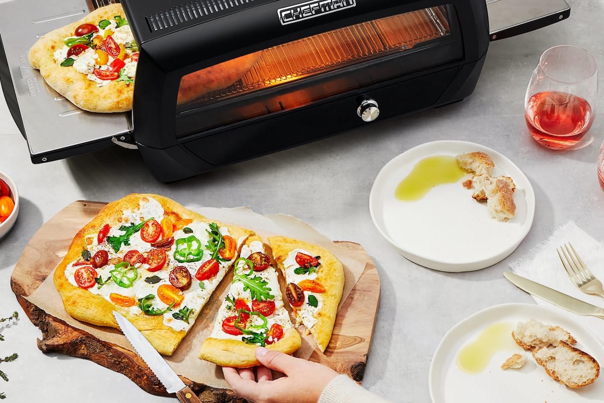 Chefman Food Mover Conveyor Belt Toaster Oven gives you a front-row seat to your cooking food