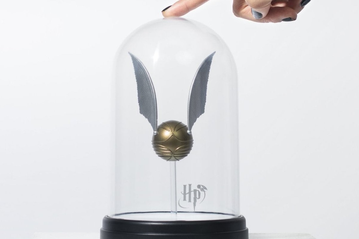 Golden Snitch Globe Light turns on with a single touch