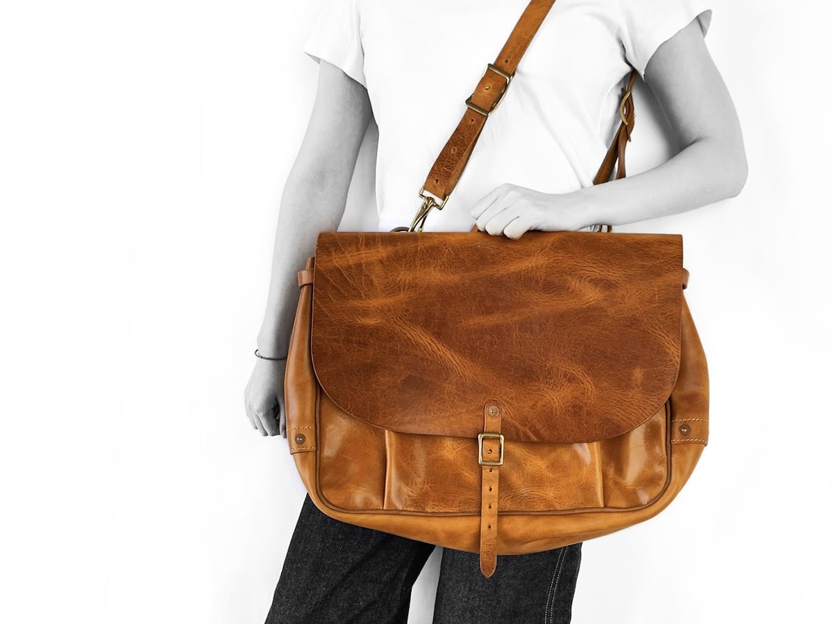 Shecane US Mail Leather Bag comes in both 13″ and 15″ laptop sizes
