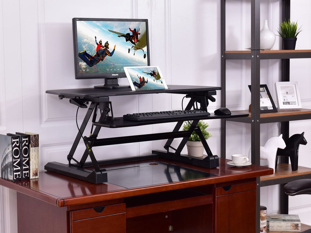 Tangkula Dual-Monitor Standing Desk offers smooth and easy adjustments