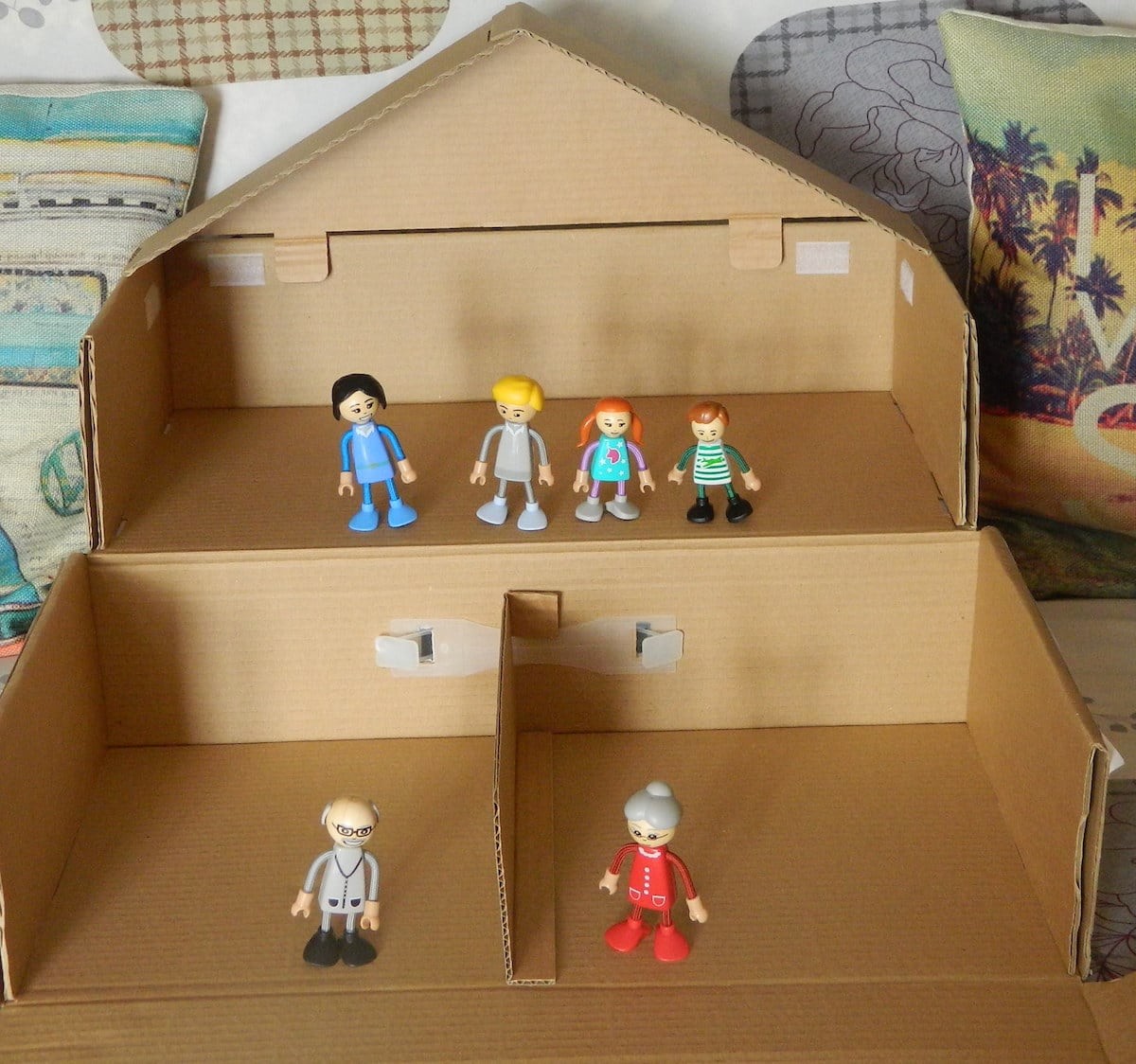 This Transformable Cardboard Box Toy Is a Suitcase and House