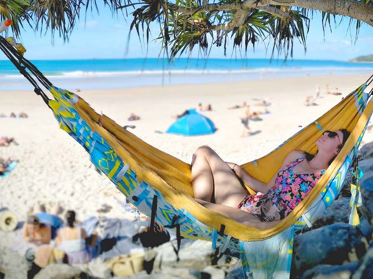 This travel accessory is a hammock, bag, & towel in one