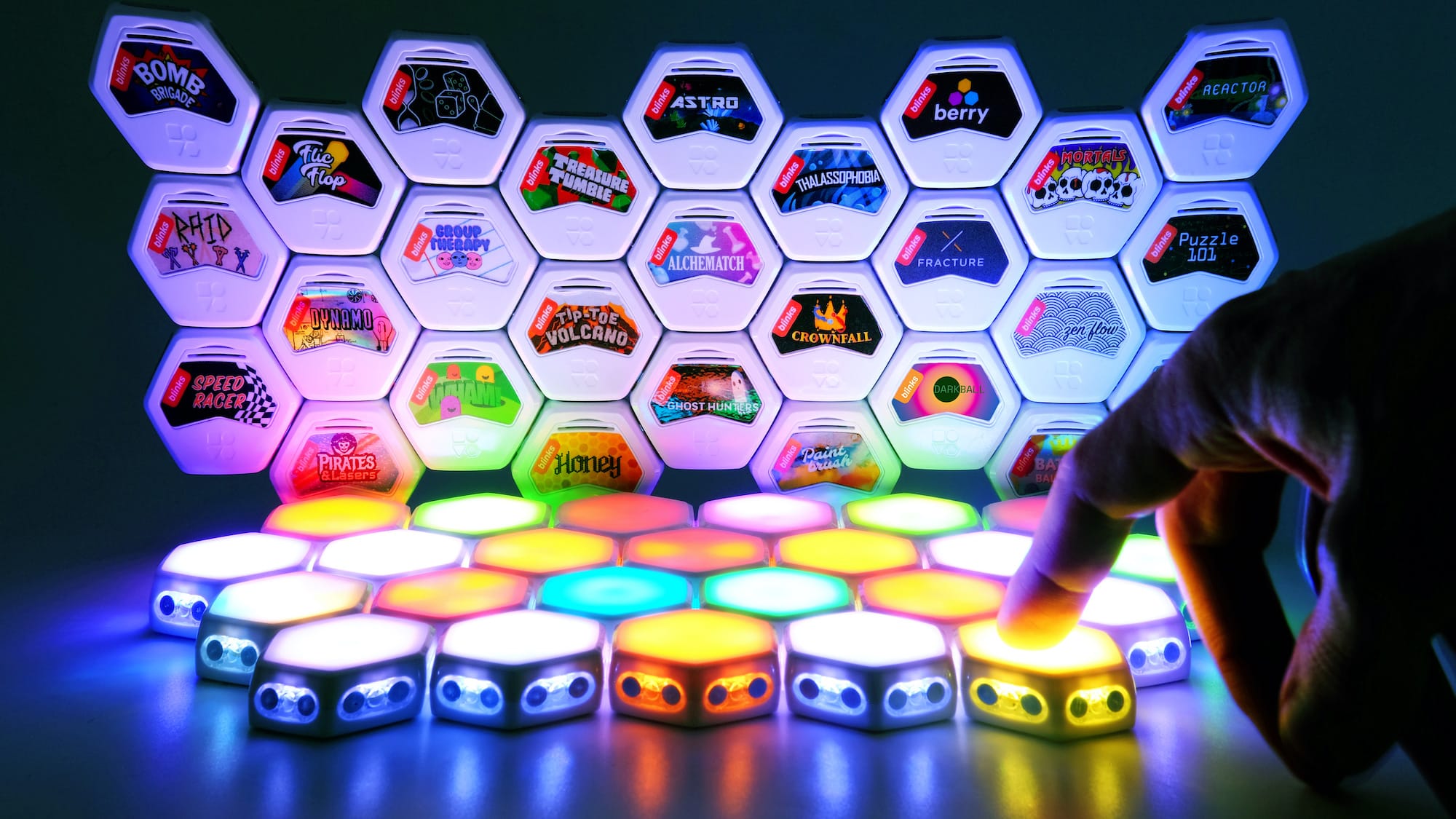 Blinks by Move38 smart tabletop game system has futuristic, touch