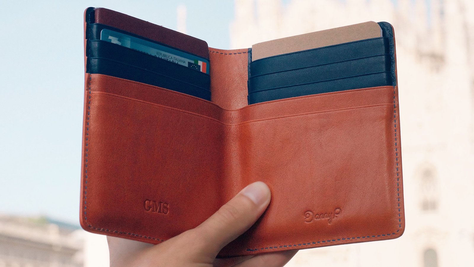 Danny P. Leather Passport Wallet has a passport slot, space for notes, & credit card slots