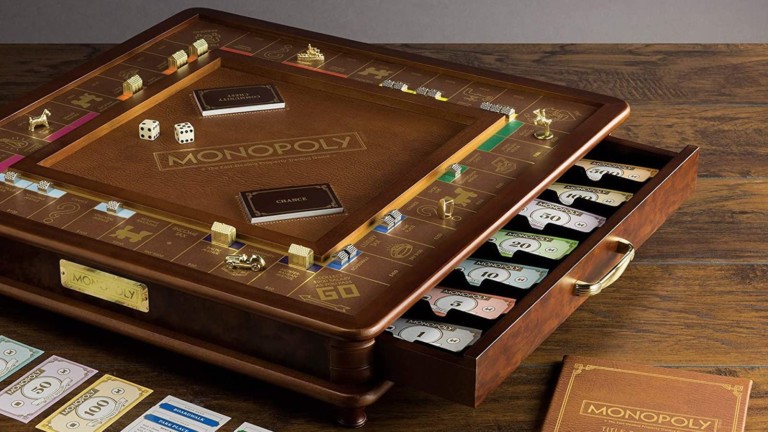 Winning Solutions Monopoly Luxury Edition board game has a faux-leather rolling area