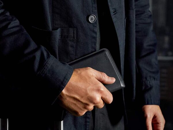 Bellroy Apex Leather Passport Cover holds your ID, 2 cards, bills, and included micro pen