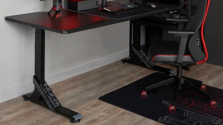 IKEA UPPSPEL gaming desk adjusts between sitting and standing modes