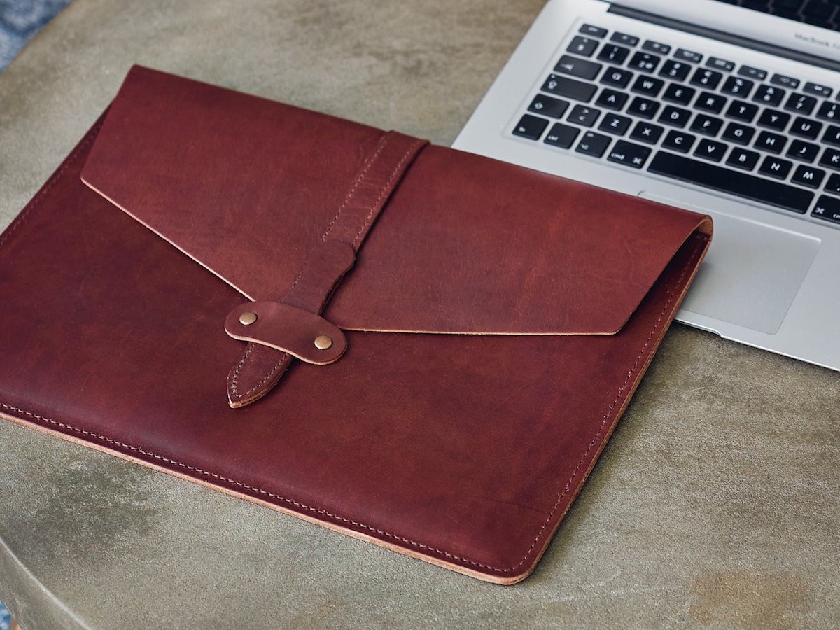 Kasperi Leather Secure Laptop Sleeve comfortably fits a laptop up to 13 inches