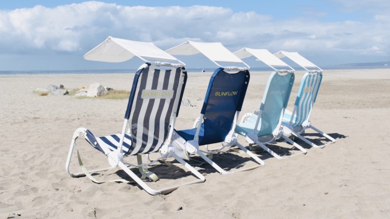 The SUNFLOW <em class="algolia-search-highlight">Beach</em> Bundle setup includes a chair, shade, drink holder, dry bag, and towel