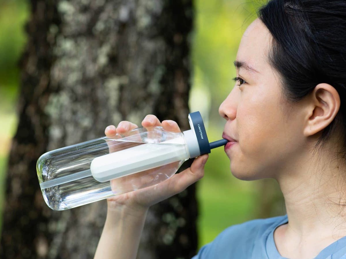 Lumistraw water-purifying bottle with a reusable straw gives you instantly clean water