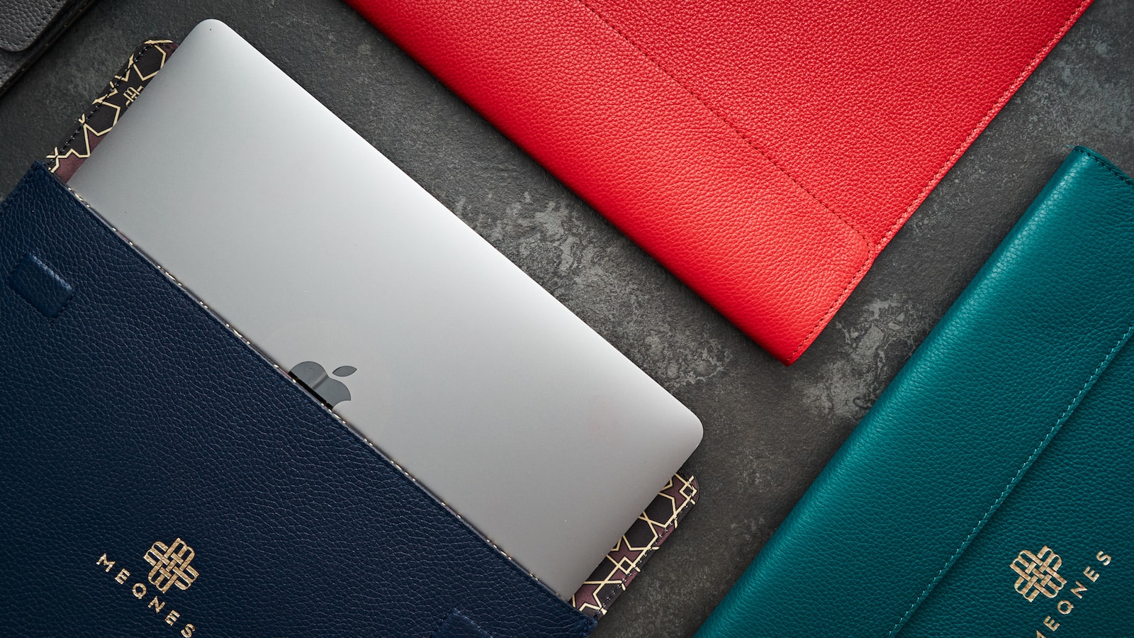 Meqnes Leather Laptop Sleeves are handcrafted and lined with Moroccan-inspired patterns