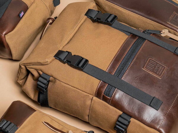 Topo Designs Rover Pack Heritage Canvas mountain backpack features a water-resistant upper
