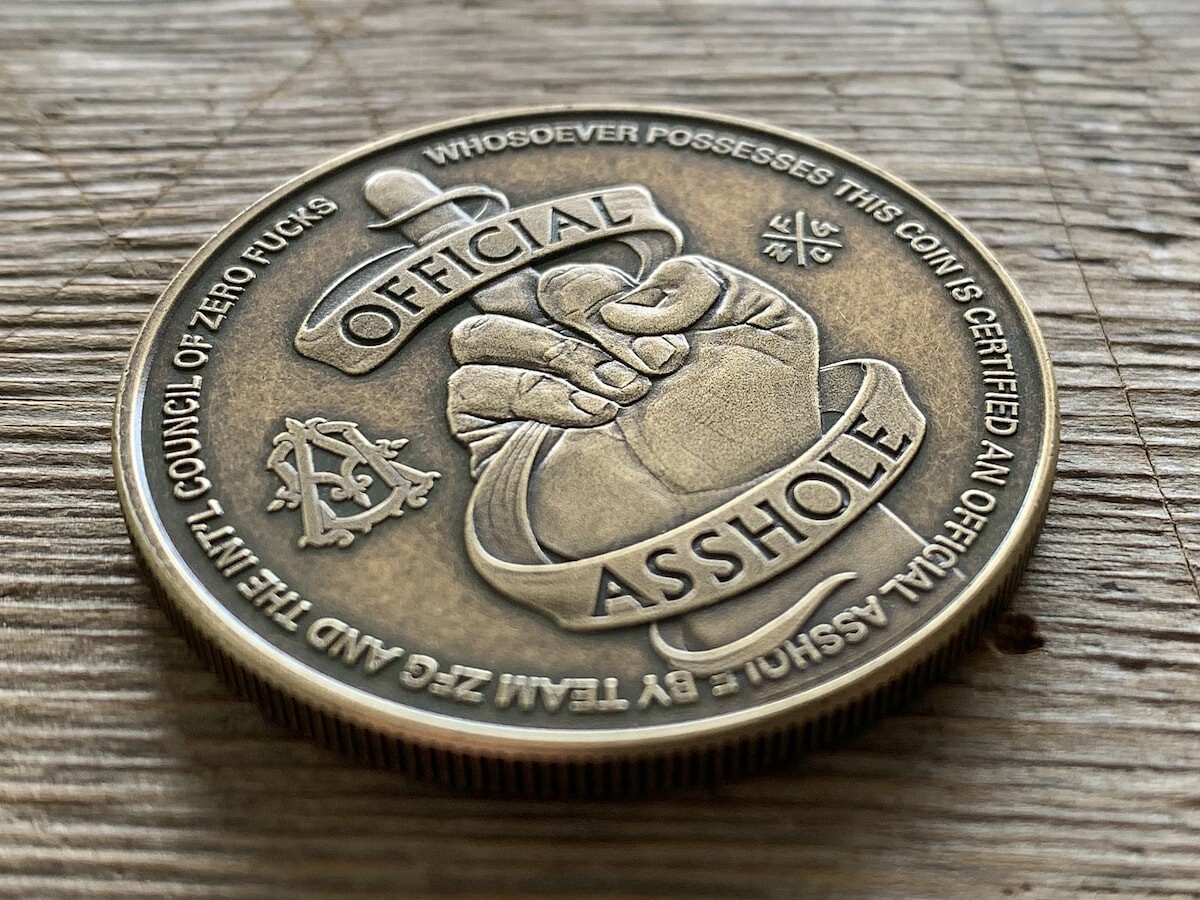 Official Asshole Coin novelty badge gives you a badge of honor for your attitude