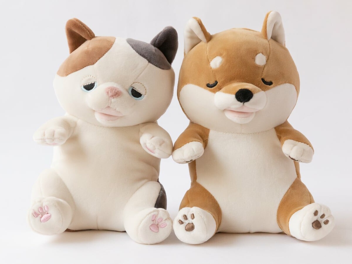 Yukai Engineering AMAGAMI HAM HAM comforting pet robot nibbles on your