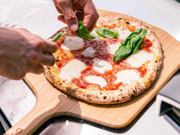 Ooni Bamboo Pizza Peel and Serving Board is lightweight and launches pizza into the oven