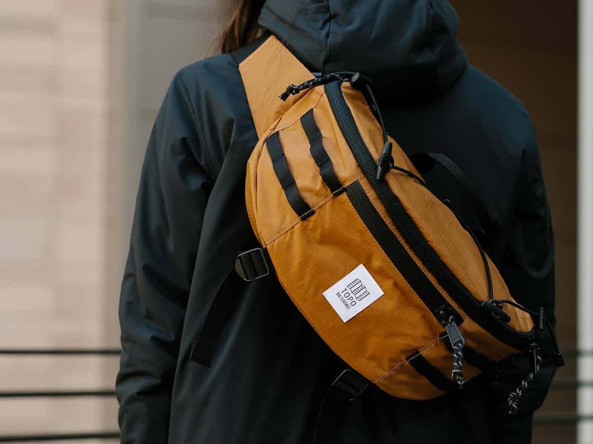 Topo Designs Mountain Sling Bag boasts a spacious main compartment and smaller pockets