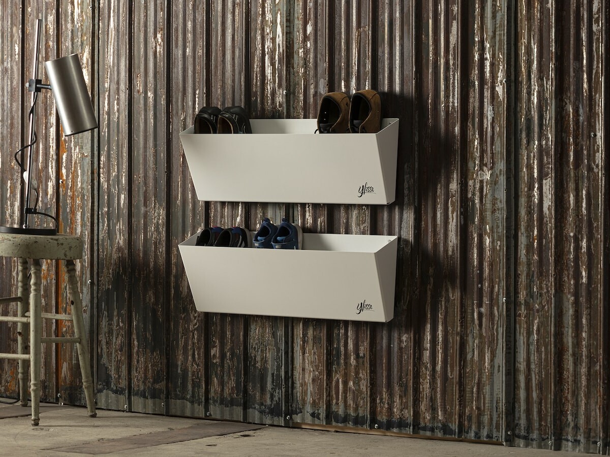 Ylisse Avril minimalist shoe storage neatly arranges footwear for a welcoming entryway