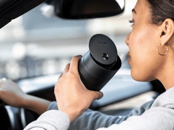 Carter Move Mug and Slide-Lock Lid opens easily with the flick of a thumb on the go