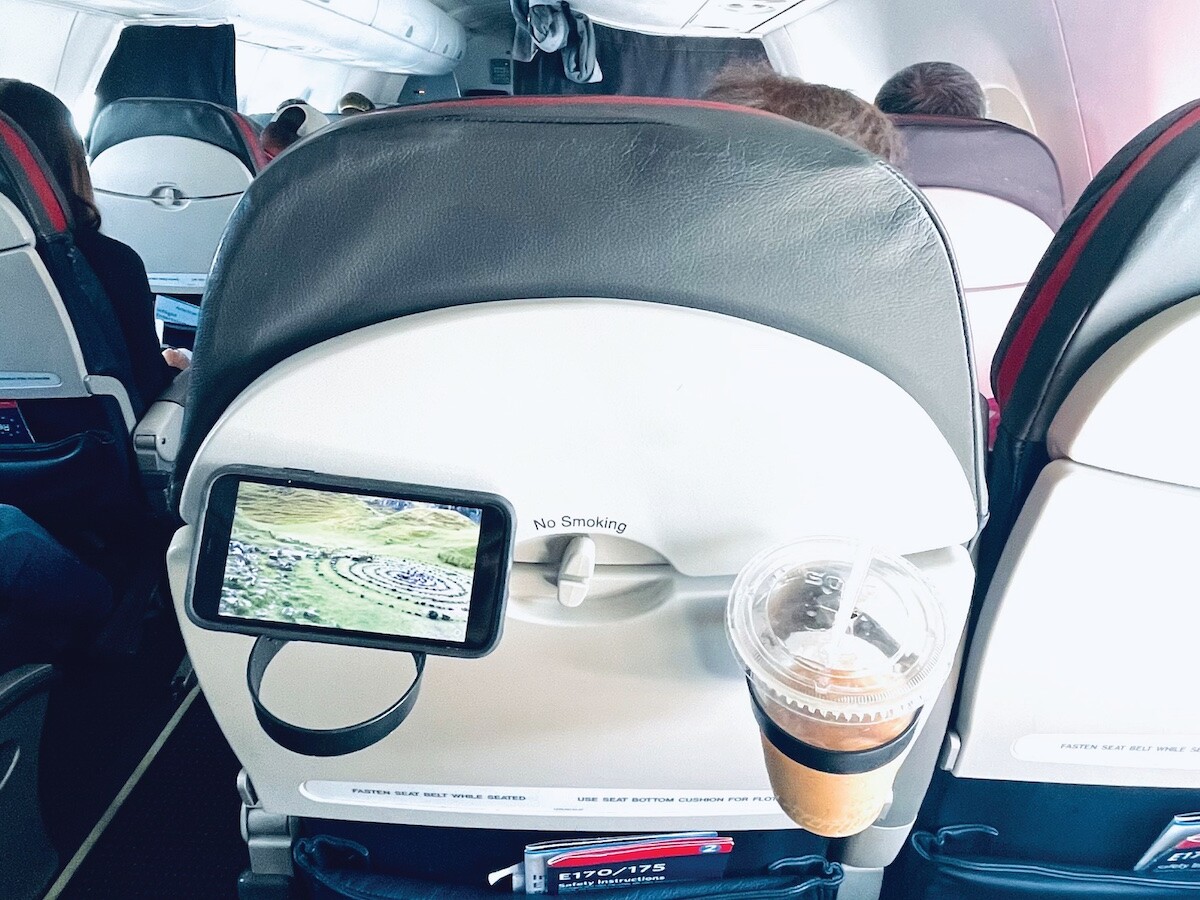 Airplane Drink Holder travel accessory provides a solution for your holiday travel needs