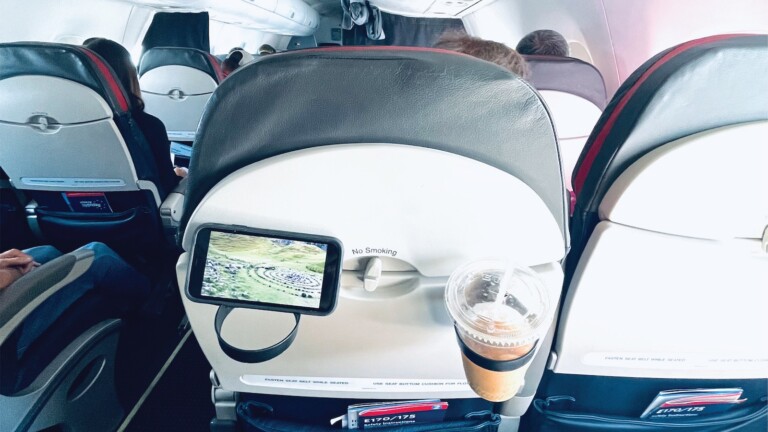 Airplane Drink Holder travel accessory provides a solution for your holiday travel needs