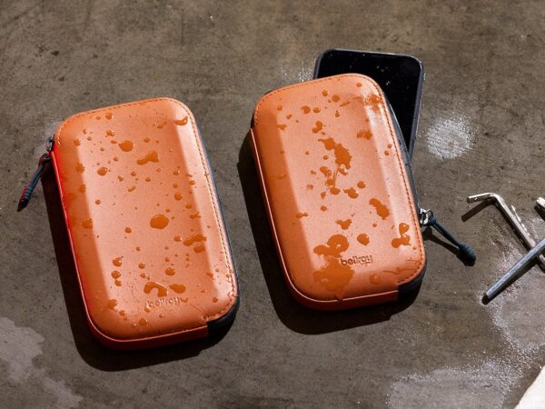 Bellroy All-Conditions Phone Pocket protects your essentials from water, mud, sand, etc.
