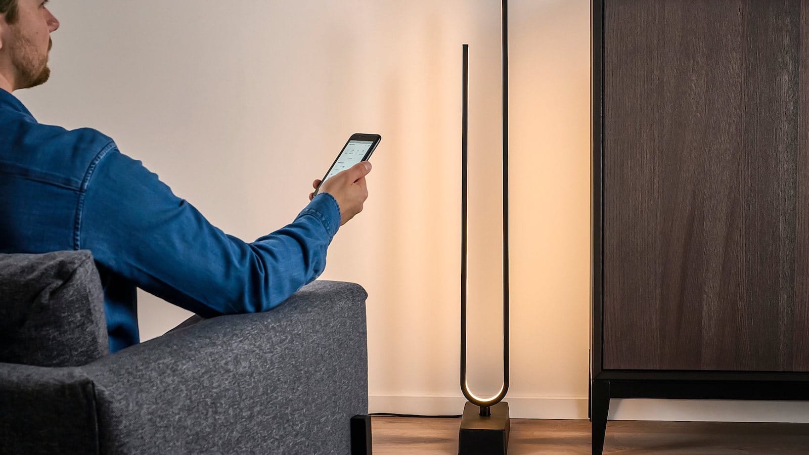The IKEA PILSKOTT smart LED floor lamp has a geometric design