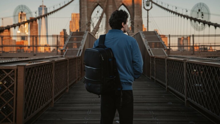 SANDMARC Travel Backpack for iPhone has a shoulder strap holder for your smartphone