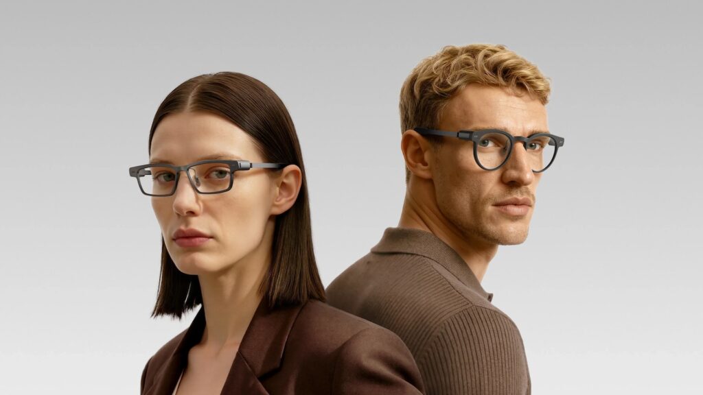 Memomind AI glasses on a man and a woman