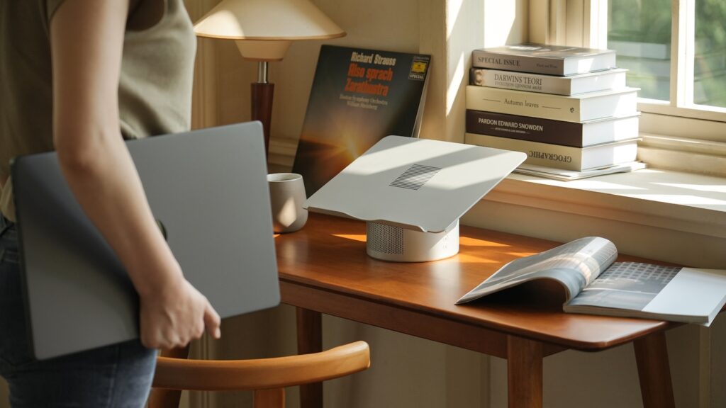 Mossion M1 laptop stand on a workspace