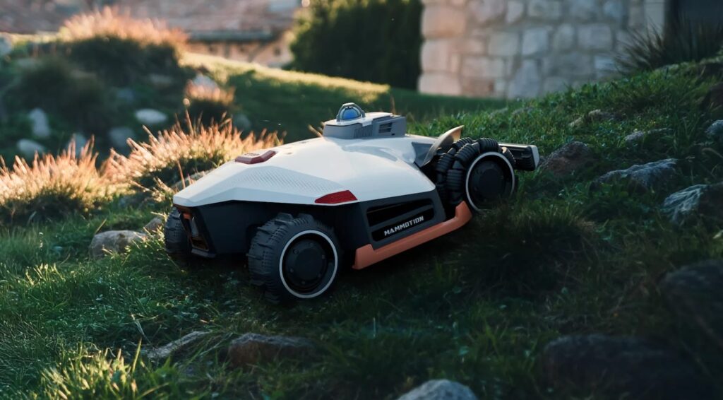 Mammotion Luba3 AWD mowing the lawn over rocky terrain