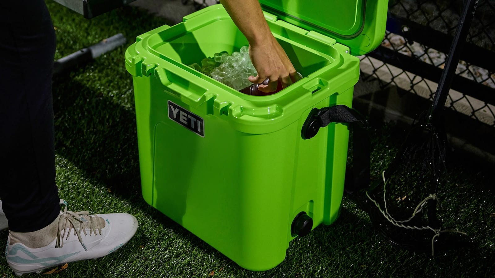 Roadie 24 Portable Cooler comfortably fits behind a car seat