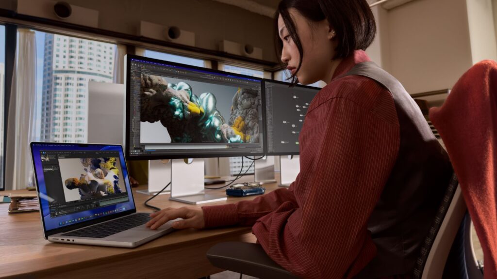 Apple MacBook Pro M5 with an editor