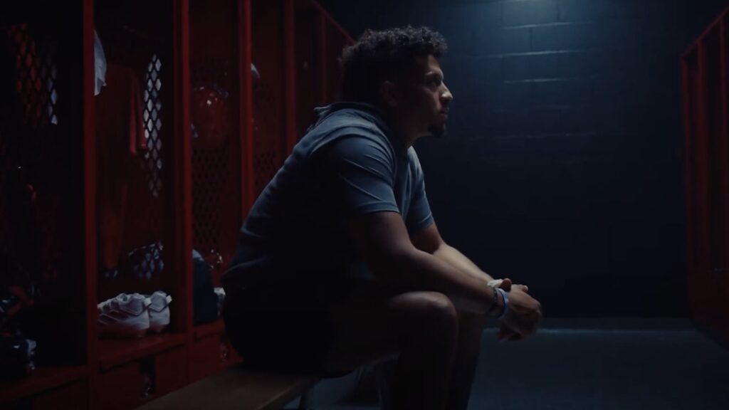 WHOOP 5.0 on a man in a locker room
