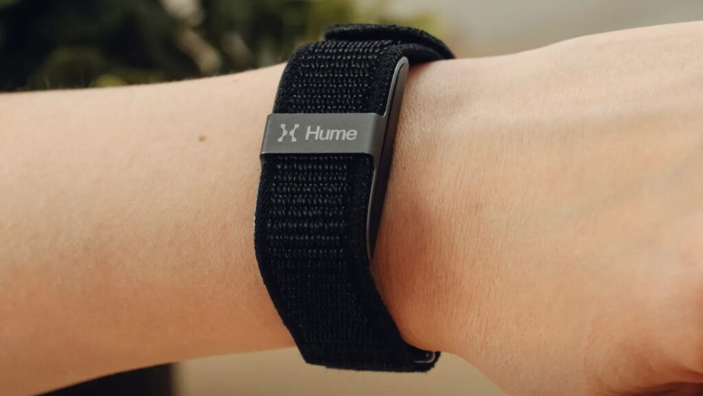 WHOOP 5.0 vs Hume Band 2.0 on person's wrist